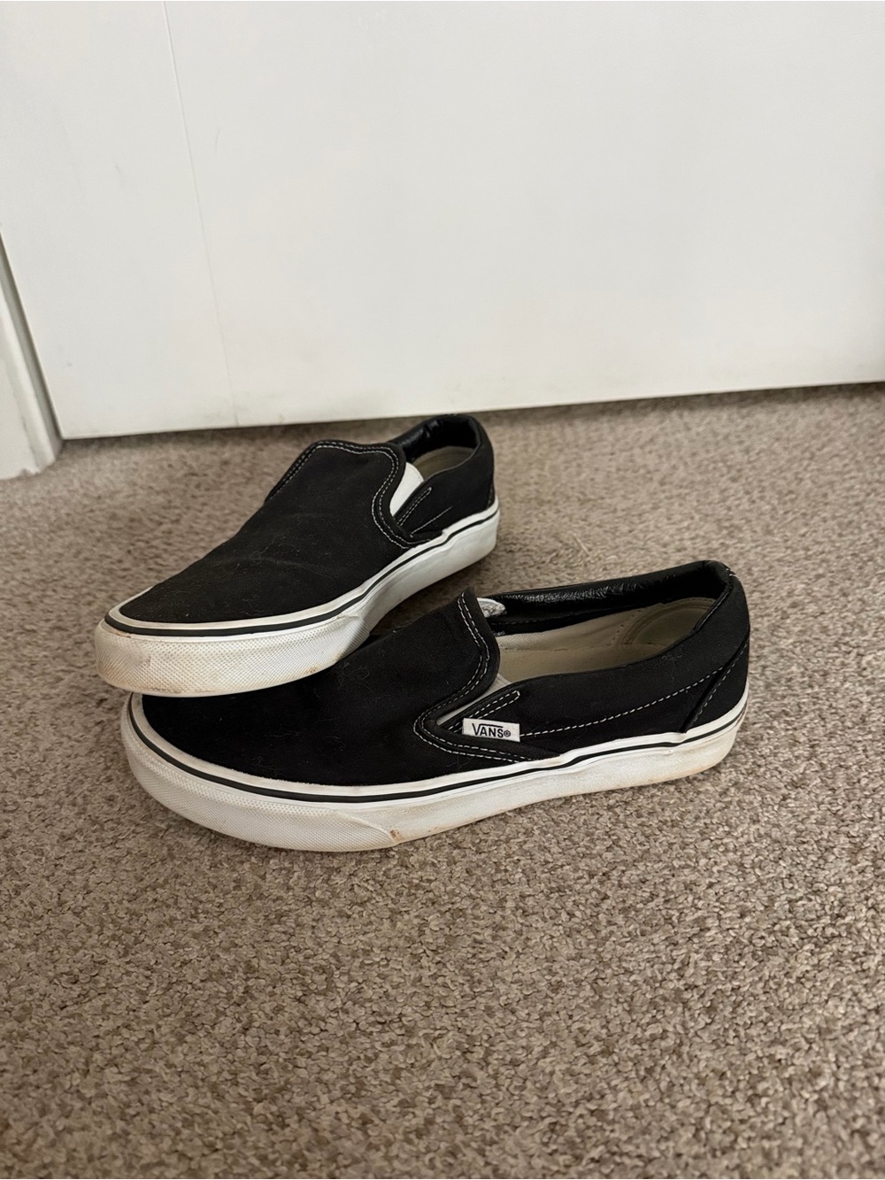 Vans Black and White Slip-On Canvas Sneakers Women’s 7.5